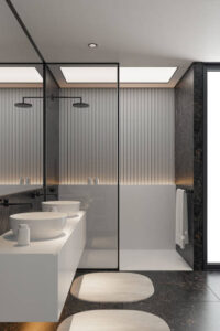 A stunning modern minimalist master bathroom in a luxury hotel suite featuring double sinks, a spacious shower, large ceramic tiles, and ambient spotlights. The clean, sleek design showcases contemporary elegance, ideal for interior design firms, real estate professionals, renovation services, ceramic tile manufacturers, and bath furniture sellers. Perfect for promoting premium bathroom designs and stylish home upgrades.